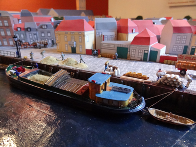 878195 Detail van de maquette van het noordoostelijk deel van ‘Wijk C anno 1925’, gemaakt door stagiaires van het ...